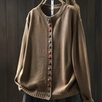 Taupe knit cardigan with ribbed trim and multicolor button-front placket.
