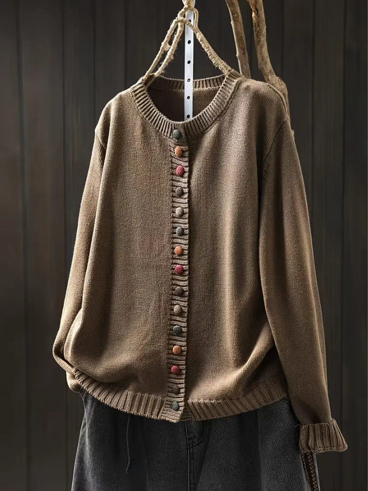 Taupe knit cardigan with ribbed trim and multicolor button-front placket.