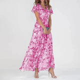 Pink floral midi dress with V-neck and flutter short sleeves, fitted waist