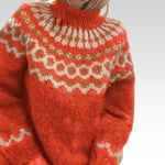 Cozy roll-neck sweater in orange-red with cream and multicolor fair-isle pattern
