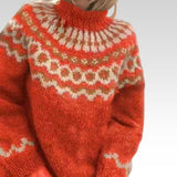 Cozy roll-neck sweater in orange-red with cream and multicolor fair-isle pattern