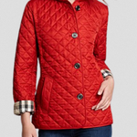 Red quilted hooded jacket with diamond pattern, button front, plaid inner cuffs