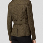 Olive green quilted fall jacket with back yoke seam and belt detail