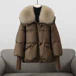 Brown puffer jacket with beige faux fur collar, front zip and flap pockets