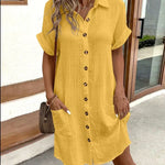 Yellow polo shirt dress with short sleeves, button placket, and side pockets