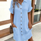 Light blue polo shirt dress with short sleeves, button placket, and side pockets