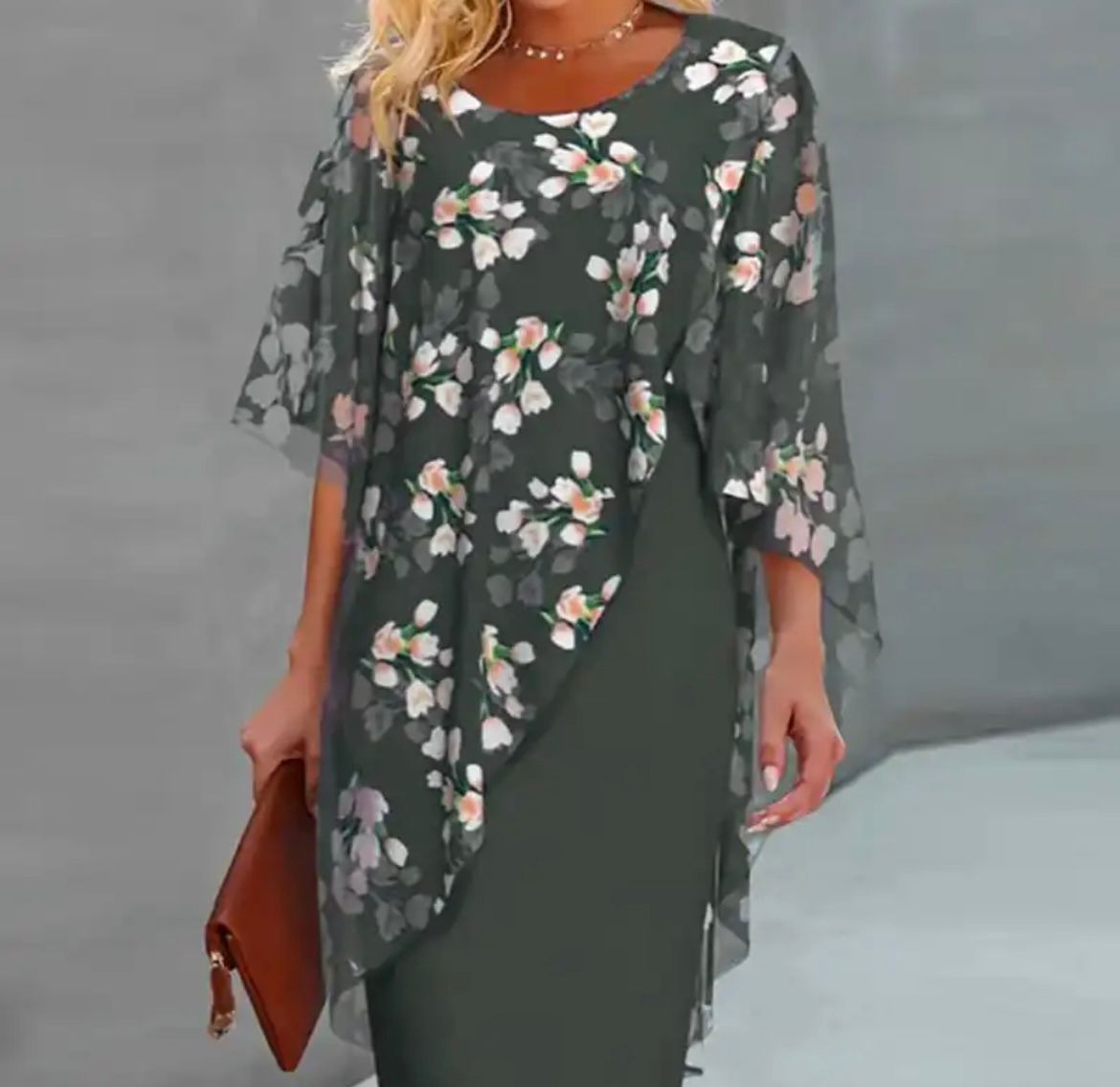 Floral dress with sheer cape sleeves, dark green base and light pink blossoms