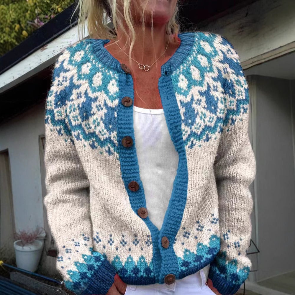 Fair isle vintage cardigan close-up: blue trim, cream knit, wooden buttons, long sleeves