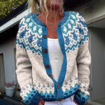 Fair isle vintage cardigan close-up: blue trim, cream knit, wooden buttons, long sleeves