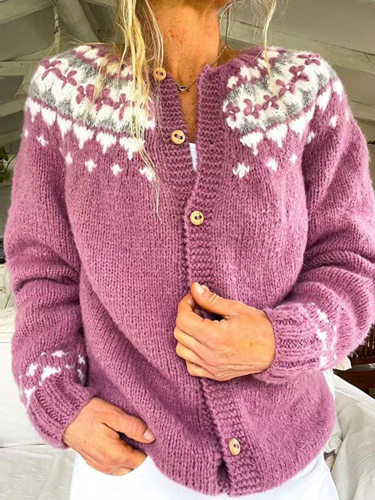 Vintage Icelandic cardigan close-up: mauve purple knit, fair isle sleeves, gold buttons