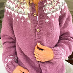 Vintage Icelandic cardigan close-up: mauve purple knit, fair isle sleeves, gold buttons