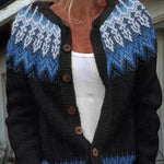 Vintage handcrafted Icelandic cardigan close-up, black knit with blue fair isle and buttons