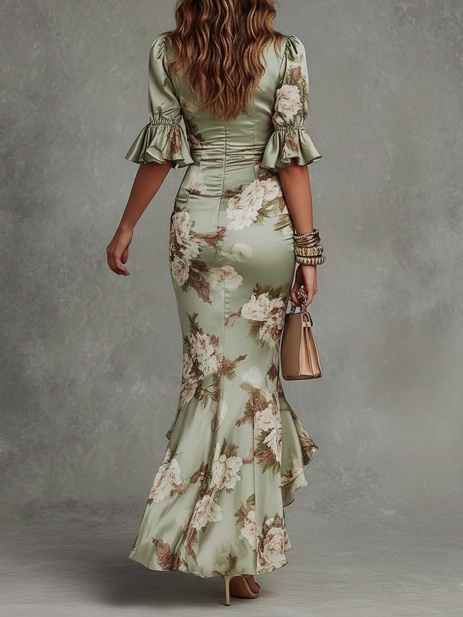 Kassy green floral maxi dress, back view with gathered seams and ruffled hem