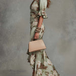 Kassy green floral maxi dress with V-neck ruched bodice and flutter sleeves, side slit