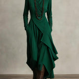 Green long-sleeve maxi dress with high neck and cascading draped wrap skirt