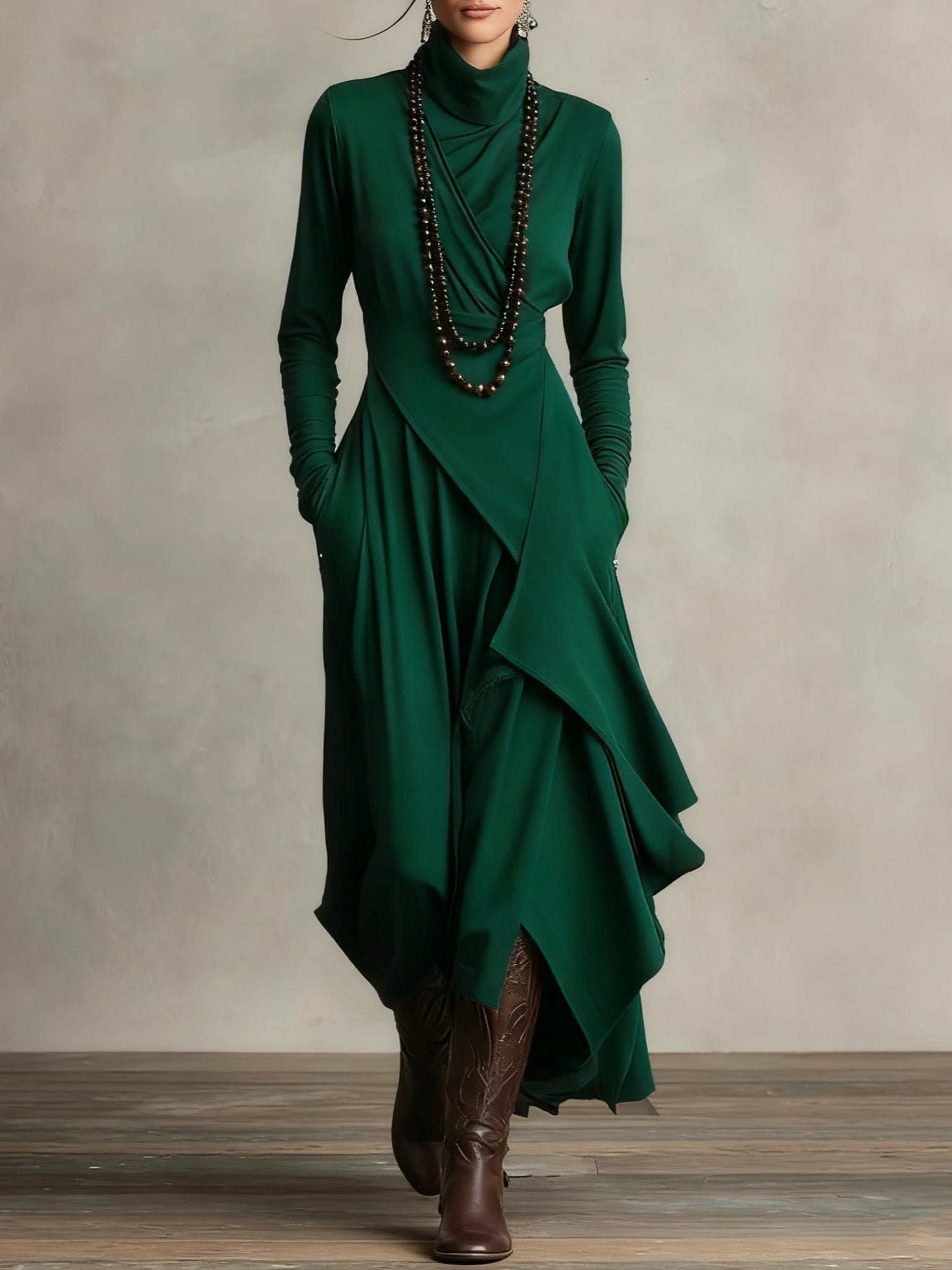Green long-sleeve maxi dress with high neck and cascading draped wrap skirt