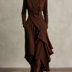 Brown long-sleeve maxi dress with high neck and layered draped wrap skirt