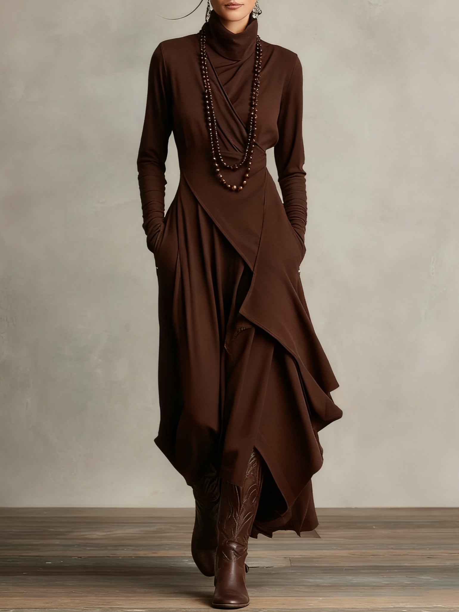 Brown long-sleeve maxi dress with high neck and layered draped wrap skirt