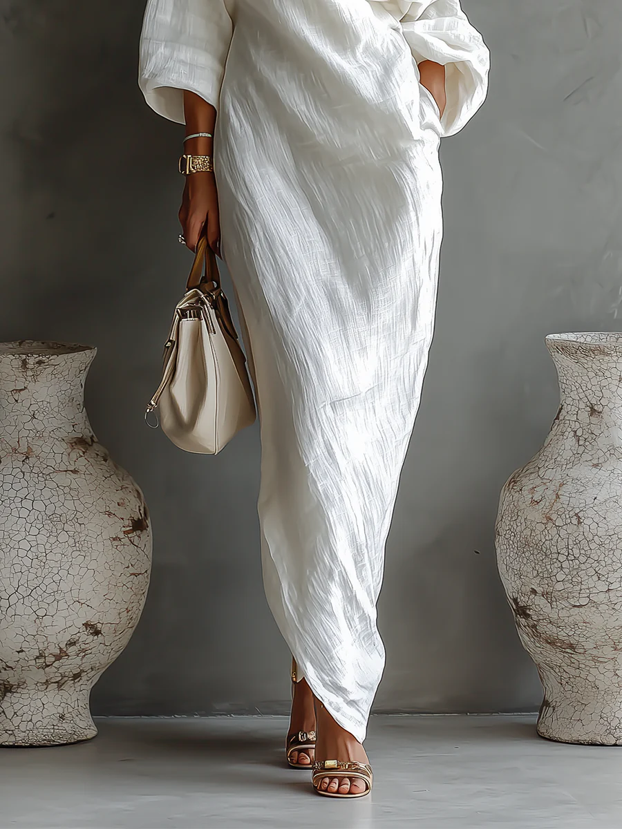 Nelle™ chic white maxi dress, side view with draped waist and three-quarter sleeves