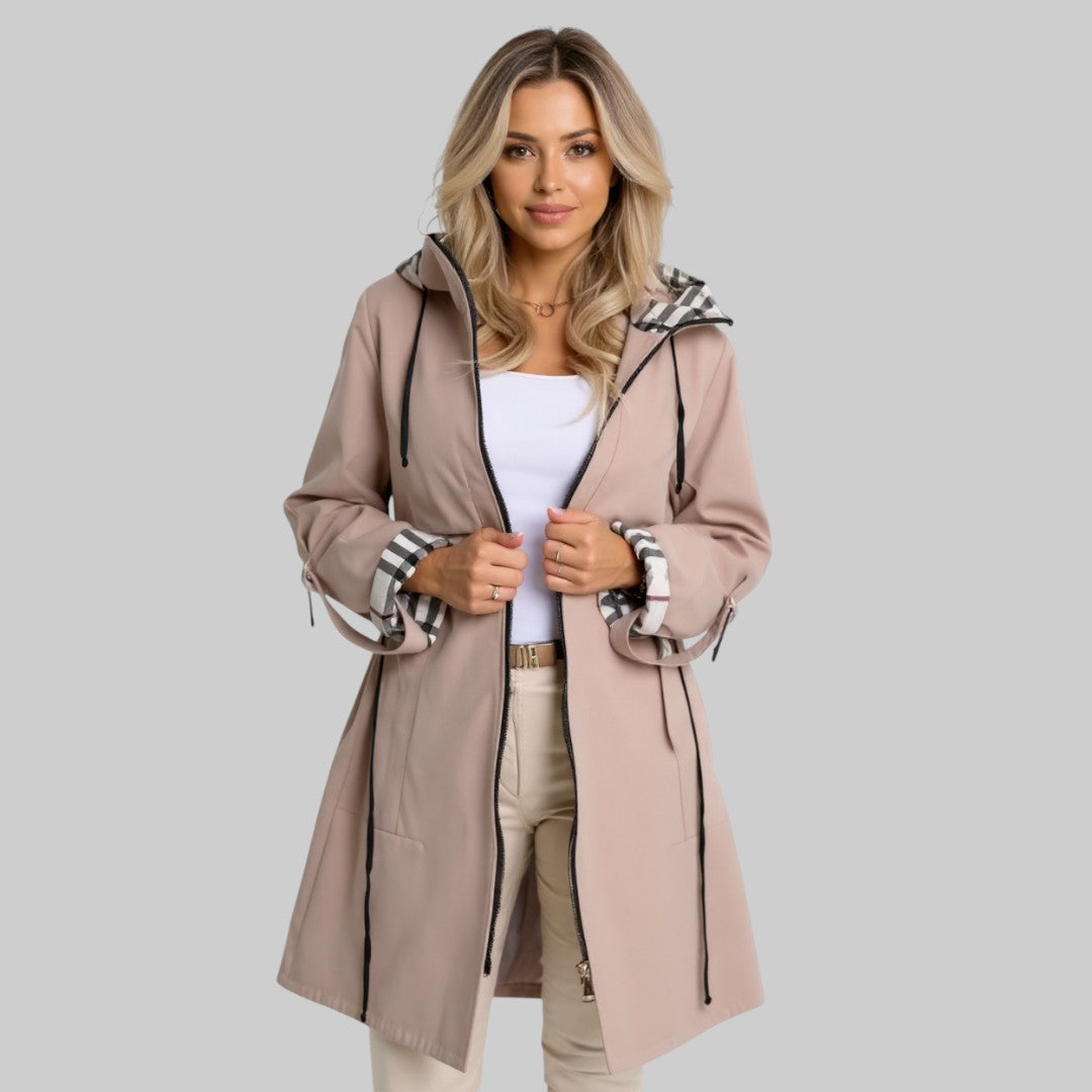 Hooded zip coat in light taupe with plaid hood and cuffs, side pockets, drawcord.