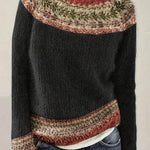 Womens dark knit pullover with crew neck, long sleeves, multicolor patterned yoke and hem trim