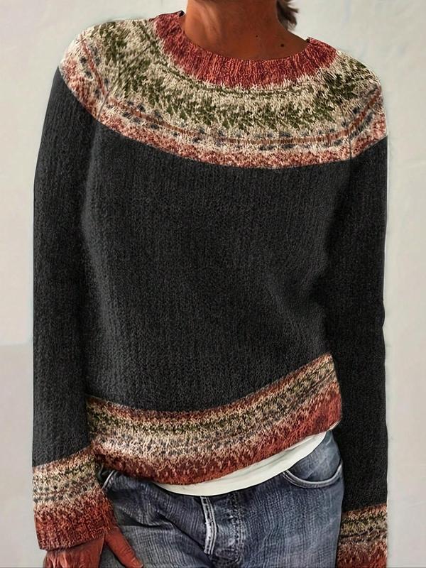 Womens dark knit pullover with crew neck, long sleeves, multicolor patterned yoke and hem trim