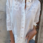 White embroidered long-sleeve cardigan with scalloped lace trim and button placket