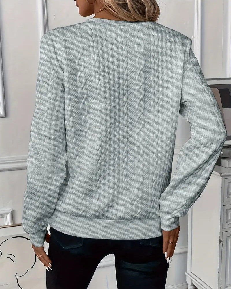 Women\u2019s back view half-zip cable-knit pullover sweater in light gray, long sleeves