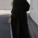 Black long knit cardigan with open front, long sleeves, and side pockets