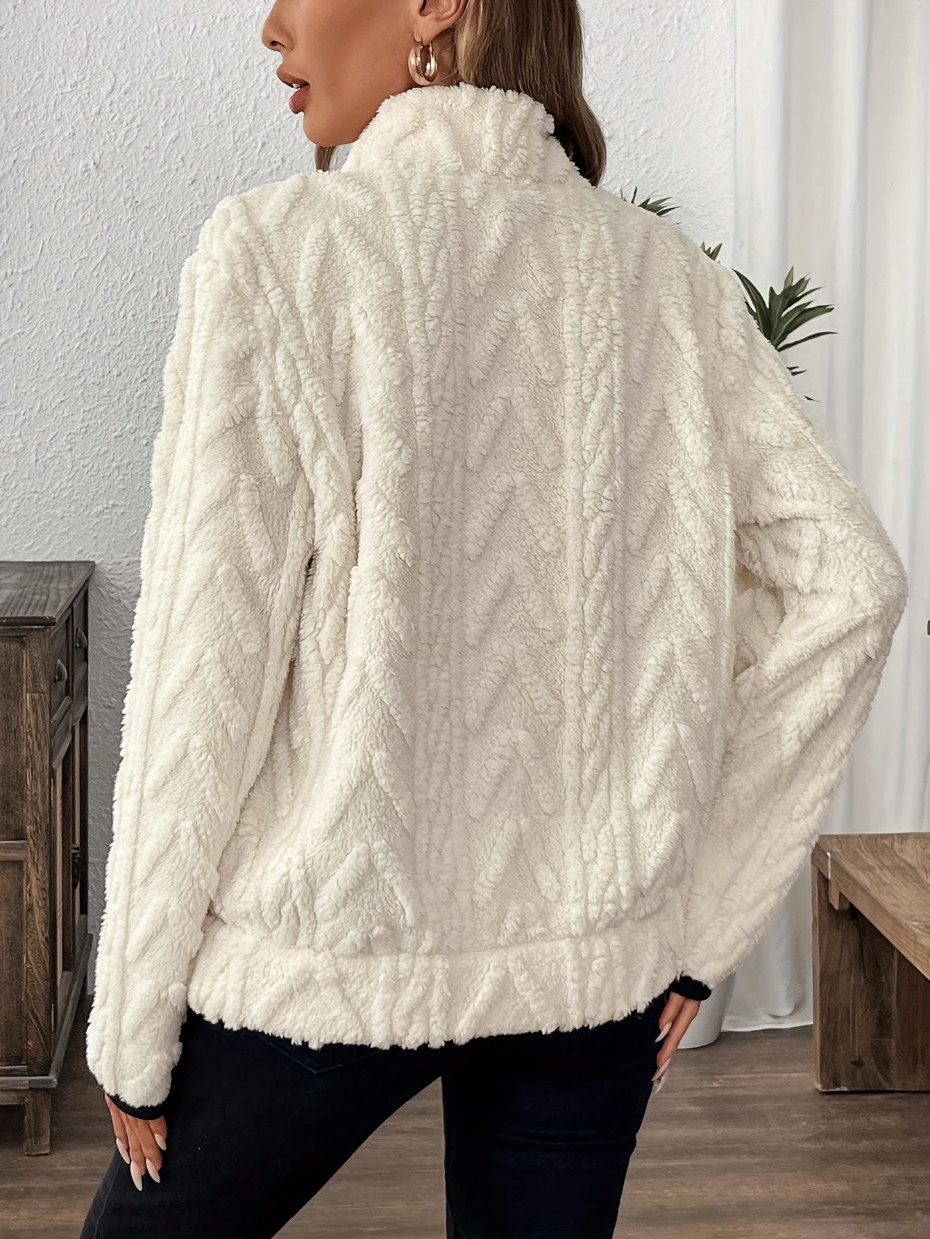 White fuzzy quarter-zip pullover, full back with textured pattern