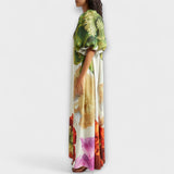 Skylar - Maxikleid mit floralem Muster, asymmetrischem Ausschnitt und Ballonärmeln