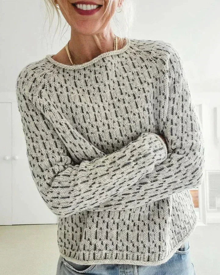Womens crew-neck knit pullover, heather speckled texture, long sleeves, ribbed cuffs
