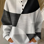 Colorblock long-sleeve henley sweater with black and white panels