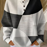 Colorblock long-sleeve henley sweater with black and white panels
