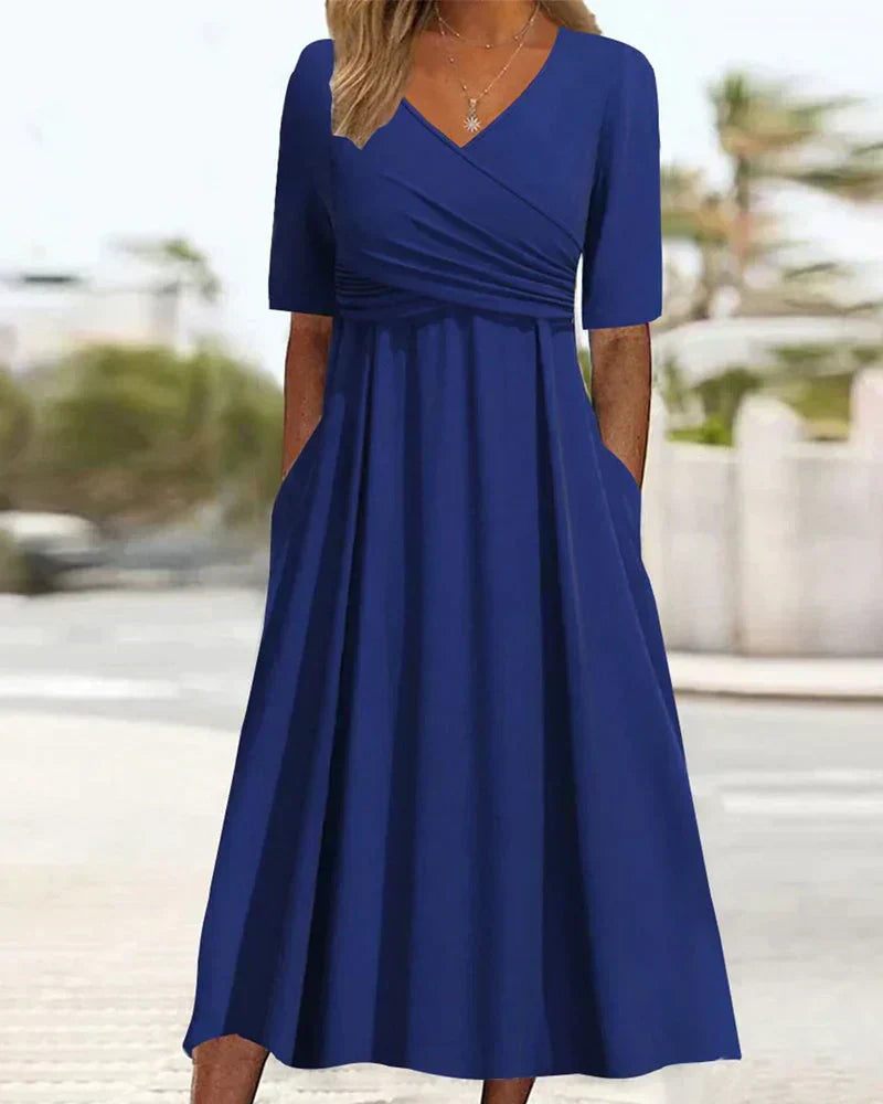 Blue crossover short-sleeve dress with V-neck and gathered waist
