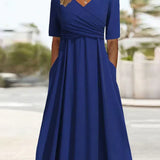 Blue crossover short-sleeve dress with V-neck and gathered waist