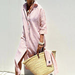 Striped summer dress with button front and long sleeves, pink and white vertical stripes