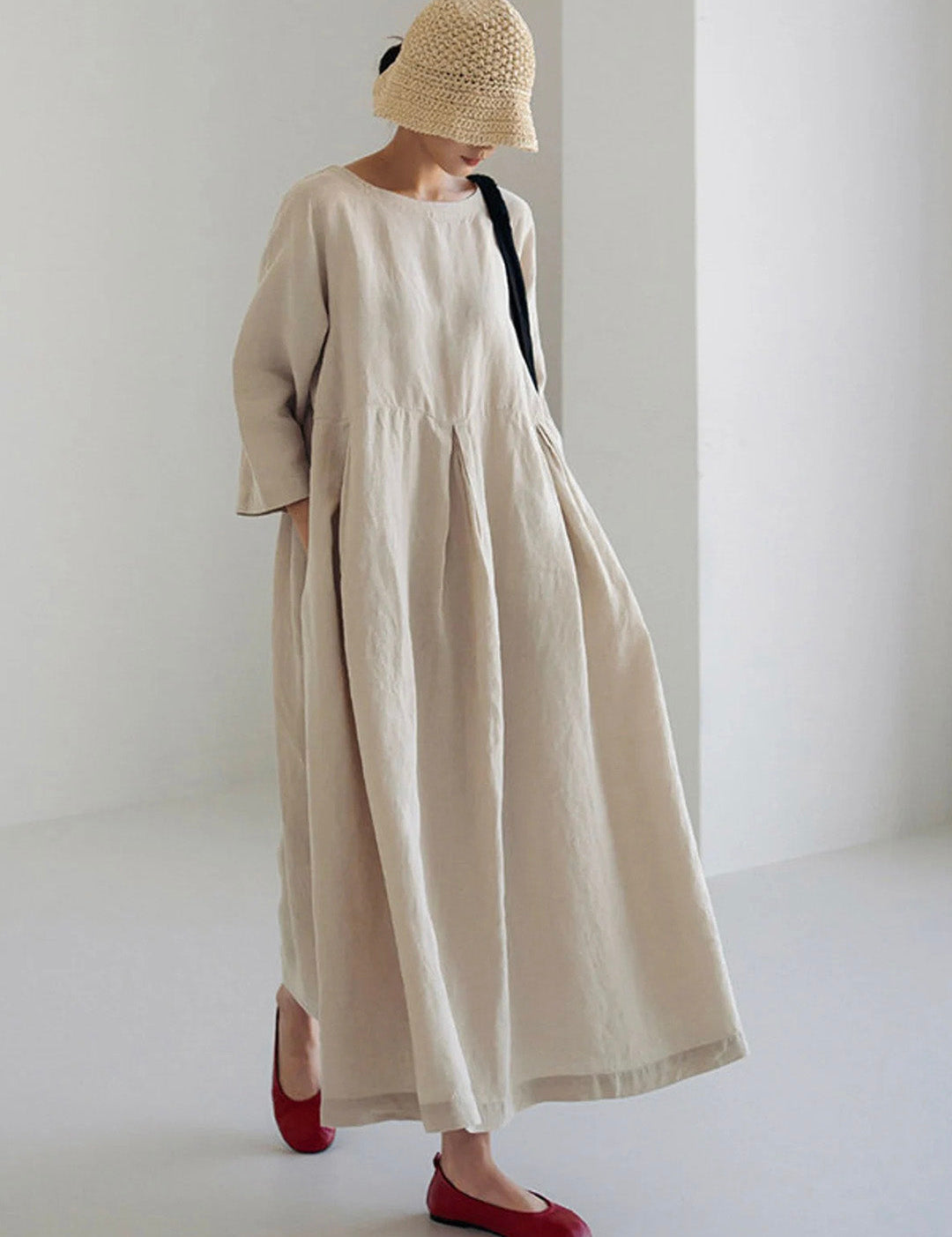Beige loose linen dress with side pockets, gathered waist, elbow-length sleeves