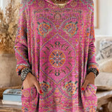 Vintage-inspired hooded knit tunic with front pockets, pink and purple multicolor ethnic print