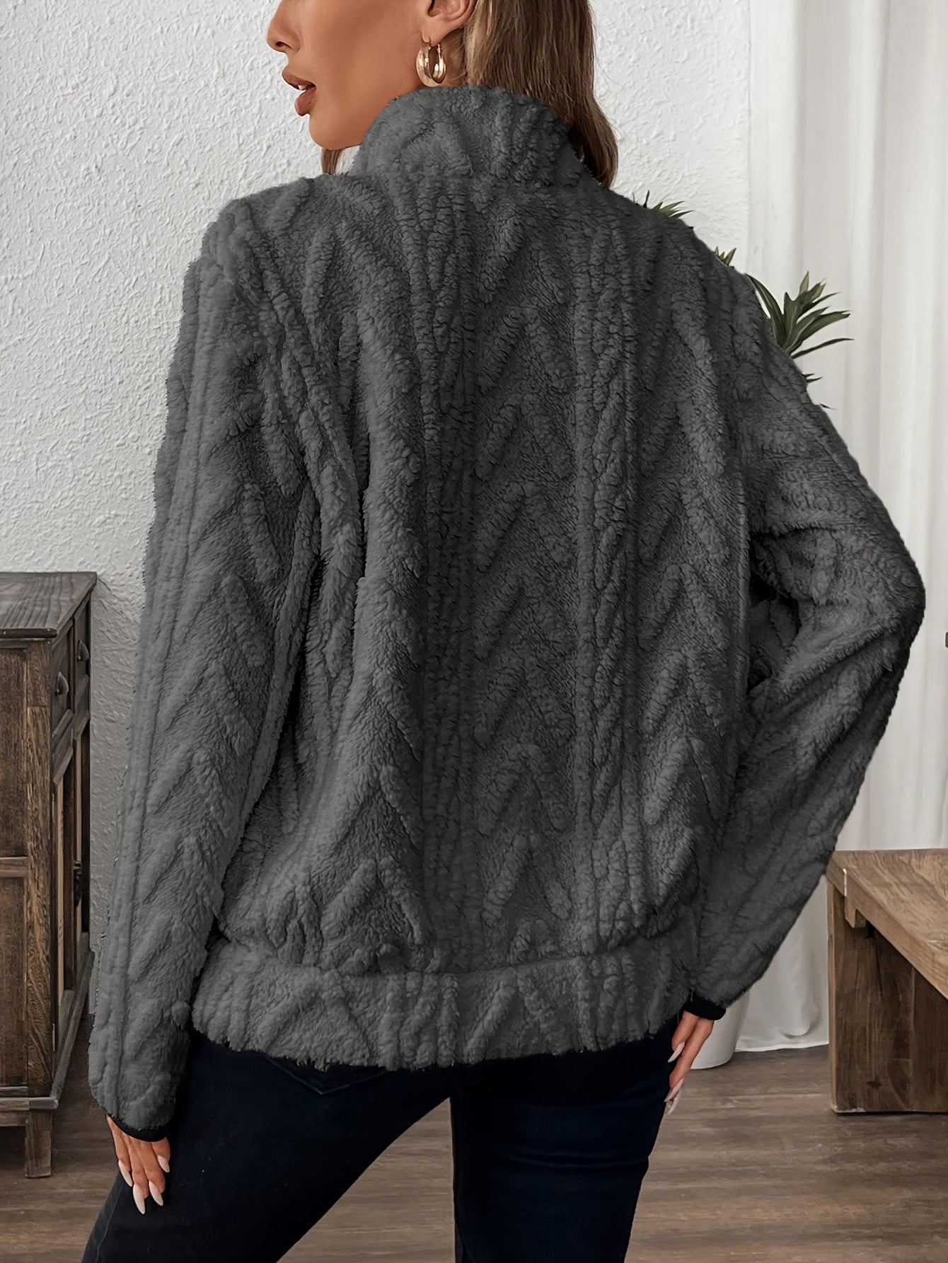 Dark gray fuzzy quarter-zip pullover, full back with textured pattern