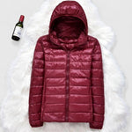 Burgundy hooded puffer jacket with full zipper and quilted front panels