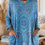 Vintage-inspired hooded knit tunic with front pockets, bright blue multicolor ethnic print
