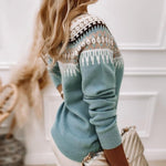 Light blue fair isle knit sweater, crew neck and long sleeves, side view