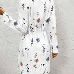 White floral dress back view with button placket and long sleeves