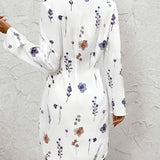 White floral dress back view with button placket and long sleeves