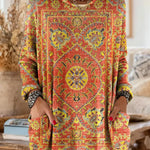 Vintage-inspired hooded knit tunic with front pockets, orange and red multicolor ethnic print