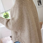 Beige khaki cable-knit vintage pullover with turtleneck, long sleeves, ribbed cuffs