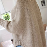 Beige khaki cable-knit vintage pullover with turtleneck, long sleeves, ribbed cuffs