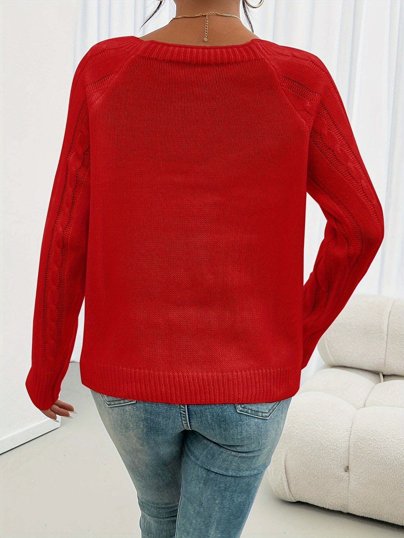 Red crewneck knit sweater, back view, with ribbed hem and long sleeves