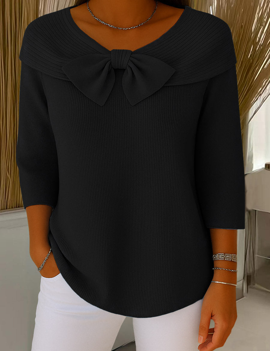 Black ribbed knit sweater with large bow collar and 3/4 sleeves